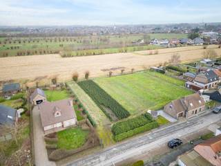 In de Langendam dichtbij het centrum van Sleidinge bieden wij u een mooi perceel bouwgrond aan met een totale oppervlakte van 1103 m² en...