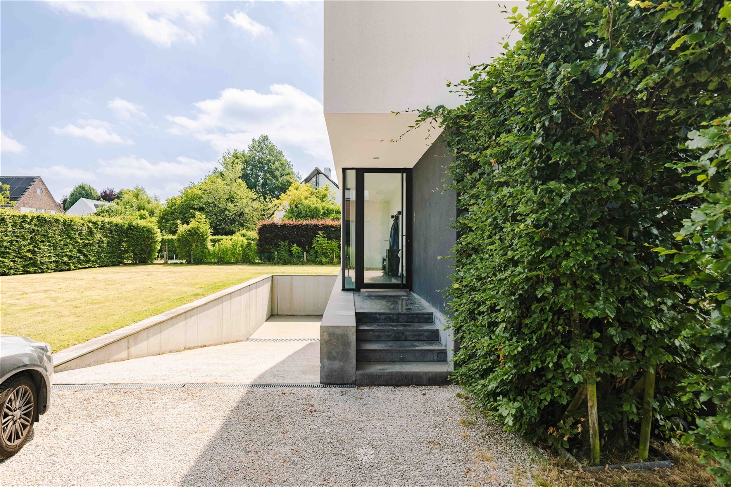 Moderne instapklare villa in een oase van groen nabij de Leie - foto 5
