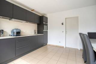 Are you looking for a family home in a quiet location without sacrificing accessibility? Then this house in the Magerstraat in Heule is definitely worth a visit.<br /><br />The house is located in a pleasant and child-friendly neighborhood, a short distance from shops, schools, public transport and many other facilities. In addition, you will enjoy a smooth connection to the center of Kortrijk and the main access roads, which ensures an ideal combination of peace and accessibility.<br /><br />Layout:<br />Ground floor:<br />- Entrance hall with guest toilet<br />- Bright living space with large windows<br />- Installed open kitchen<br />- Spacious garage<br />- Basement, ideal for extra storage <br /><br />First floor:<br />- 3 full bedrooms<br />- Bathroom with bath, shower, toilet and sink<br />- Attic floor, ideal as extra storage space<br /><br />As an extra asset, the house has a pleasant garden, where you can relax and enjoy the outdoors in peace.<br /><br />In short, a well-kept family home with a practical layout, lots of comfort and an excellent location in the popular Heule.<br /><br />Would you like more information about this property or would you like a site visit? Contact Alissia Dewitte (0472 18 64 21 - alissia.dewitte@dewaele.com)<br /><br /><br />This property is subject to the renovation obligation imposed by the Flemish government for residential buildings (unless demolished within 5 years of purchase). For more information, consult the website of the Flemish Energy and Climate Agency at https://www.vlaanderen.be/een-woning-kopen/renovatieverplichting-voor-residentiele-gebouwen<br /><br />Register of measures: no