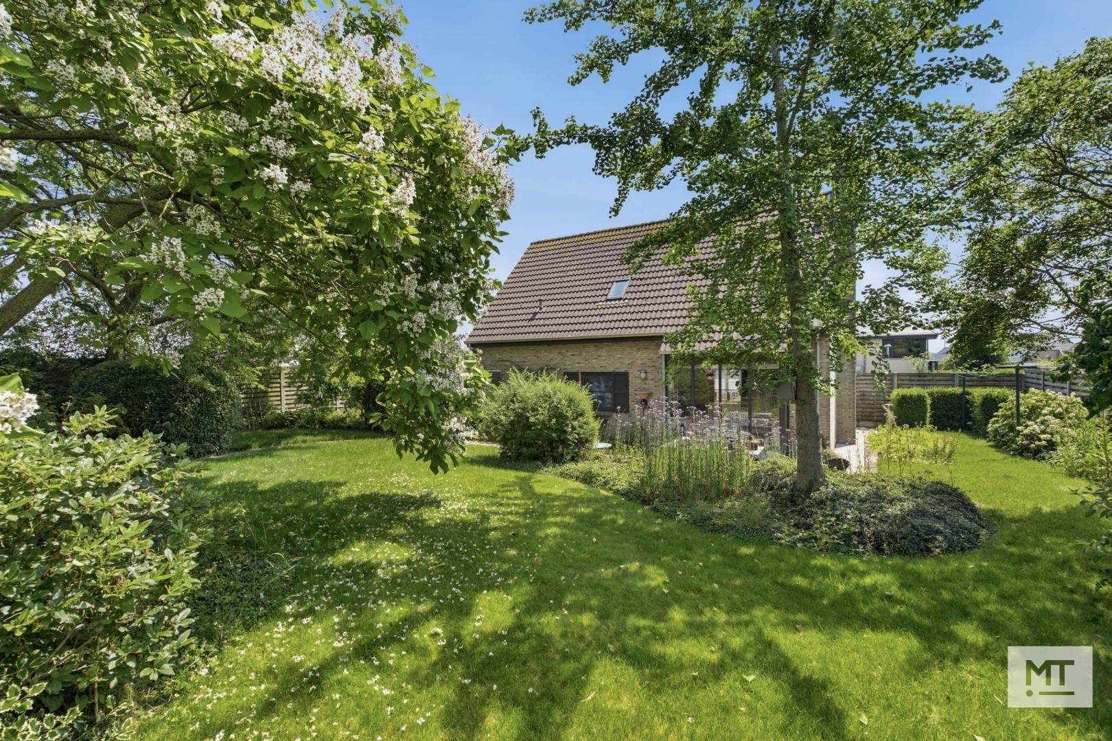 Alleenstaande woning met 4 slaapkamers, zonnige tuin en garage op de Molenhoek - foto 3