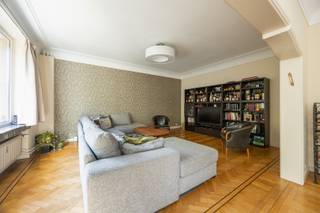 <p><span>ANTWERP - Mechelsesteenweg:</span><span> Spacious and attractive apartment of approx. 227 m² with a façade width of approx. 14 m, 4 bedrooms, 3 bathrooms and terrace. EPC Rating B. </span></p><p><span> </span></p><p><span>Enjoy space, natural light and comfort in the sought-after Harmonie neighbourhood on the Mechelsesteenweg. Located on the fourth floor, this exceptionally spacious apartment offers approx. 227 m² of living space. Thanks to its wide facade, the apartment benefits from an abundance of natural light. Its practical layout, generous living areas and central location make this a particularly pleasant city residence. Parks, shops, restaurants, public transport and major access roads are all within walking distance, while Antwerp's vibrant city center is just a short distance away.</span></p><p><span> </span></p><p><span>DESCRIPTION:</span></p><p><span> </span></p><p><span>Spacious entrance hall providing access to the generous living areas, cloakroom and guest toilet.</span></p><p><span>Very bright living areas with parquet flooring, comprising a spacious sitting room and an adjoining large dining room.</span></p><p><span>Fully fitted kitchen with a breakfast area and adjoining practical utility/storage room. Access to a pleasant terrace.</span></p><p><span> </span></p><p><span>Four bedrooms, two of which have their own private bathroom with shower and toilet.</span></p><p><span>Third separate bathroom with bathtub and toilet.</span></p><p><span> </span></p><p><span>Large private basement storage room included.</span></p><p><span>Possibility to rent several parking spaces in the underground car park adjoining the building.</span></p><p><span> </span></p><p><span> </span></p><p><span>KEY FEATURES:</span></p><p><span> </span></p><p><span> * Located in the sought-after Harmonie neighbourhood, close to parks</span></p><p><span> * Wide front façade of approx. 14 m</span></p><p><span> * Favourable EPC Rating B</span></p><p><span> * Pleasant terrace</span></p><p><span> * Large private storage room</span></p><p><span> * Possibility to rent several parking spaces</span></p>