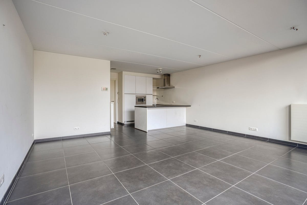 Instapklaar gelijkvloers appartement met aangename tuin - foto 3