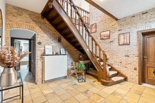IN OPTIE - Deze aantrekkelijke woning met een opvallend statige gevel is gelegen langs Holt ter hoogte van nummer 33, op enkele honderden meters...