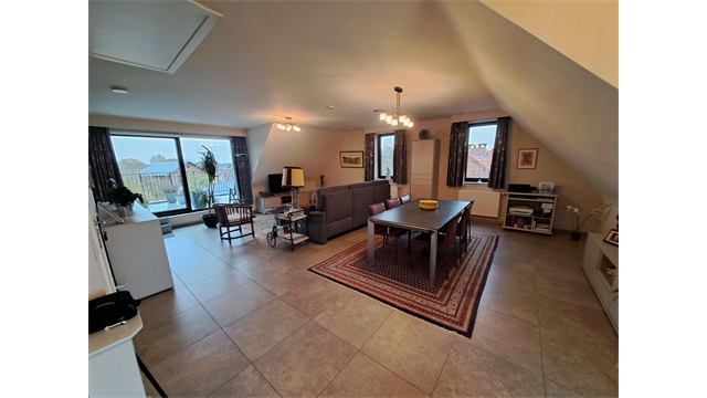 Een ruim dakappartement met terras en lift - foto 3