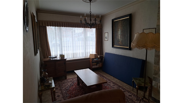 Een ruime woning met tuin en 5 garages in het centrum van Oostmalle - foto 4