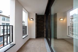 Knap en energiezuinig (E13) app in hartje Beveren!Dit app bevindt zich op de 2de verd (met lift) en is gelegen in residentie' Torenzicht', op 50m...