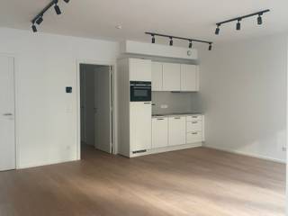 Prachtig nieuw appartement - 1ste bewoning - in Residentie Uniq, gelegen net achter de KVS, op enkele passen van het Sint-Katelijneplein. Deze flat...