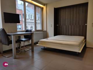 <p><span>Modern furnished studio, suitable for two persons, in the center of Leuven</span></p><p><span> </span></p><p><span>This studio has a view on the Bondgenotenlaan and is fully furnished. Because of its unique location in the center of Leuven and close to public transport, this is your ideal base. This studio is suitable for </span><span>two persons</span><span>. </span></p><p><span> </span></p><p><span>The studio is fully equipped. You have a sofa, double bed, table and chairs, desk and television. The kitchenette is fully equipped with refrigerator, dishwasher, microwave and stove. In addition, cutlery, plates and cooking utensils are also provided for you. </span></p><p><span> </span></p><p><span>The bathroom has a shower, toilet and sink. Do you have a washing machine or dryer? The connection is available. </span></p><p><span> </span></p><p><span>The building is equipped with an elevator. In the basement of the building you can dispose of your waste and there is space to store your bicycle. </span></p><p><span> </span></p><p><span>The monthly costs total €95. This fixed charge covers all your costs for the common parts, your heating, internet, garbage collection and at the beginning of your contract you will receive new mattress cover. </span></p><p><span> </span></p><p><span>You can also rent this studio for a shorter period. The minimum period is 6 months and the rent will be increased by 8% in this case. The charges remain the same. </span></p><p><span> </span></p><p><span>Schedule your visit now!</span></p><p><span> </span></p><p><span>015 20 36 00 - <span>info@domoxim.be</span></span><span> </span></p>