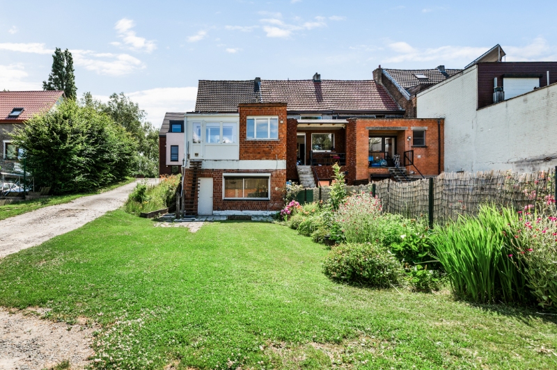 Centraal gelegen te renoveren woning met 4 SLK & mooie tuin - foto 2