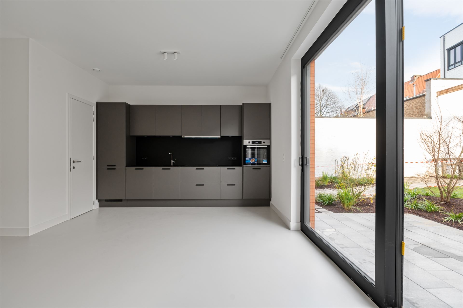 gelijkvloers nieuwbouw 2slk appartement met tuin - foto 5