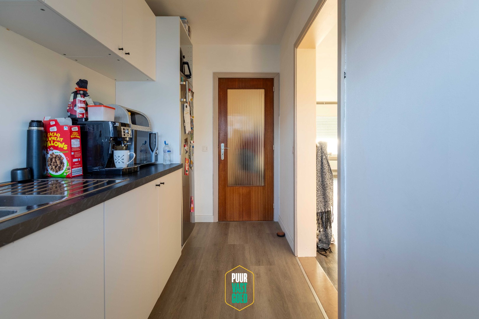 Ruim en verzorgd gelijkvloers appartement met terras en garage - foto 5