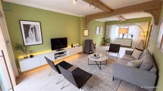 <h1><span>Charming family home with 4 bedrooms, beautiful garden and view of the Dender</span></h1><h1><span> </span></h1><p><span>Characterful and move-in ready family home with 4 spacious bedrooms, a large garden, multiple terraces, and a beautiful view of the Dender. Additionally, the property features solar panels, a heat pump, air conditioning, and an EPC label B without renovation obligation.</span></p><p><span> </span></p><p><span>Are you looking for a spacious home with character, comfort, and a unique outdoor environment? Then this charming terraced house on Buizemontstraat absolutely deserves your attention.</span></p><p><span>The house combines </span><span>authentic elements with contemporary living comfort</span><span> and offers particularly many possibilities for families due to its four spacious bedrooms and various living spaces.</span></p><p><span>An absolute asset is the </span><span>deep, southwest-oriented garden</span><span> with a stunning view of the Dender. You have two terraces, including a </span><span>covered and heated terrace with sunshade</span><span>, allowing you to enjoy this space pleasantly in every season. The landscaped garden also has a vegetable garden and practical garden storage.</span></p><p><span>You enter through the stately entrance hall with </span><span>authentic stained glass window</span><span>. The spacious living room is equipped with a gas fireplace and accommodates a cozy seating area and dining space. The open living kitchen adjoins a second dining and seating area with direct access to the garden.</span></p><p><span>The kitchen is equipped with no less than </span><span>8 quality Miele appliances</span><span>: coffee machine, oven, microwave, warming drawer, dishwasher, and gas stove.</span></p><h3><span>Layout</span></h3><p><span>Ground floor:</span><span><br />Stately entrance hall with stained glass window, spacious living room with gas fireplace, seating area and dining space, open kitchen with high-quality built-in appliances, second dining and seating area with access to the garden, covered and heated terrace with sunshade, guest toilet and access to the spacious cellar.</span></p><p><span>First floor:</span><span><br />Landing, two spacious bedrooms with fitted wardrobes and bathroom with sink unit, toilet and bathtub with shower. There is already a connection provided for an </span><span>extra bathroom</span><span>.</span></p><p><span>Second floor:</span><span><br />Landing and two full-sized bedrooms.</span></p><p><span>Third floor:</span><span><br />Finished attic room, accessible via a fixed staircase. Ideal as a hobby room, office, playroom, or extra bedroom.</span></p><h3><span>Extra assets</span></h3><ul><li><span>4 full-sized bedrooms</span></li><li><span>Spacious and bright home</span></li><li><span>Authentic elements and stylish finishing</span></li><li><span>Beautiful view of the Dender</span></li><li><span>Deep, landscaped garden with </span><span>southwest orientation</span></li><li><span>Two terraces</span></li><li><span>Covered and heated terrace with sunshade</span></li><li><span>Open living kitchen with </span><span>8 Miele appliances</span></li><li><span>Solar panels</span></li><li><span>Heat pump</span></li><li><span>Air conditioning</span></li><li><span>Rainwater collection of </span><span>10,000 liters</span><span>, connected to toilets and garden storage</span></li><li><span>Spacious cellar</span></li><li><span>Practical garden storage</span></li><li><span>Provision for an extra bathroom</span></li><li><span>Good connection with walking and cycling routes</span></li><li><span>Shops, schools, restaurants, and public transport within walking distance</span></li><li><span>EPC label B</span></li><li><span>No renovation obligation</span></li></ul><h3><span>Central location with a green surrounding</span></h3><p><span>The property enjoys a particularly pleasant location in Geraardsbergen. Shops, schools, restaurants, and public transport are within walking distance. At the same time, the rear of the house offers a surprisingly quiet environment with a view of the Dender and easy access to various walking and cycling routes.</span></p><p><span>A spacious family home with character, comfort, and an exceptional garden that allows you to enjoy peace and space every day.</span></p><p><span>Interested?</span><span> Respond via the advertisement. We will personally contact you to provide further information and schedule a visit.</span></p>