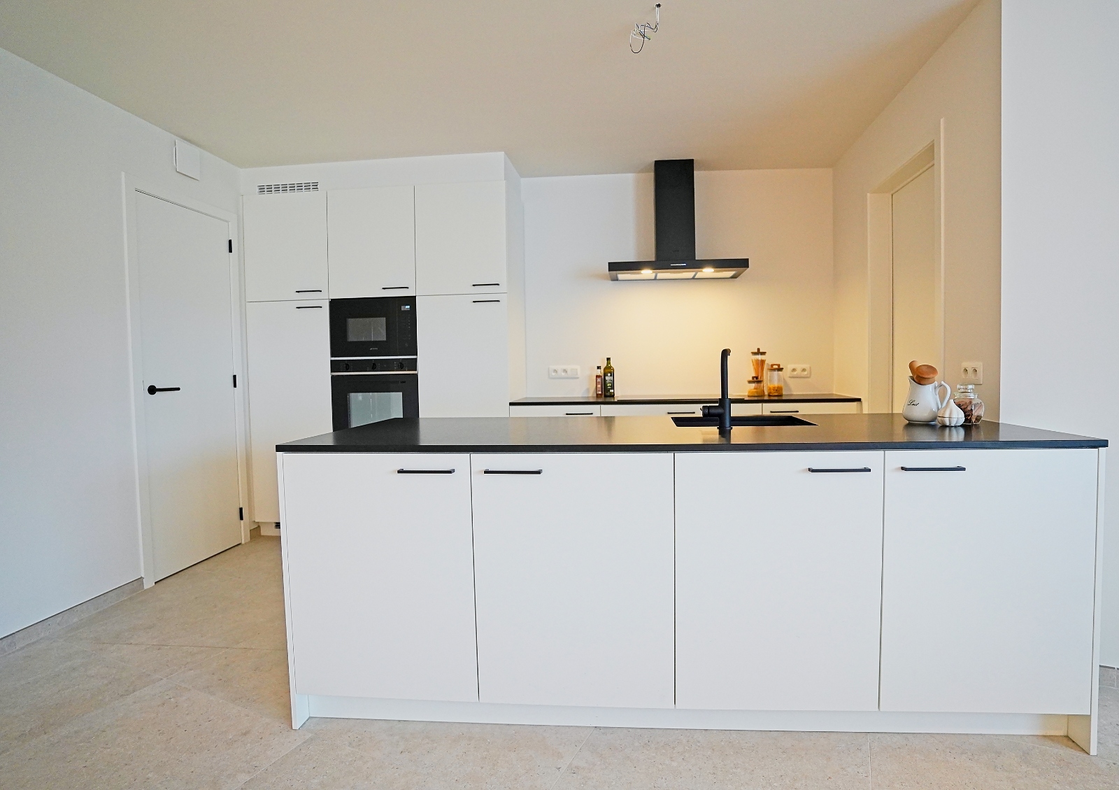 Net opgeleverd ruim nieuwbouwappartement met 2 slaapkamers en tuin in het centrum van Bornem. - foto 4