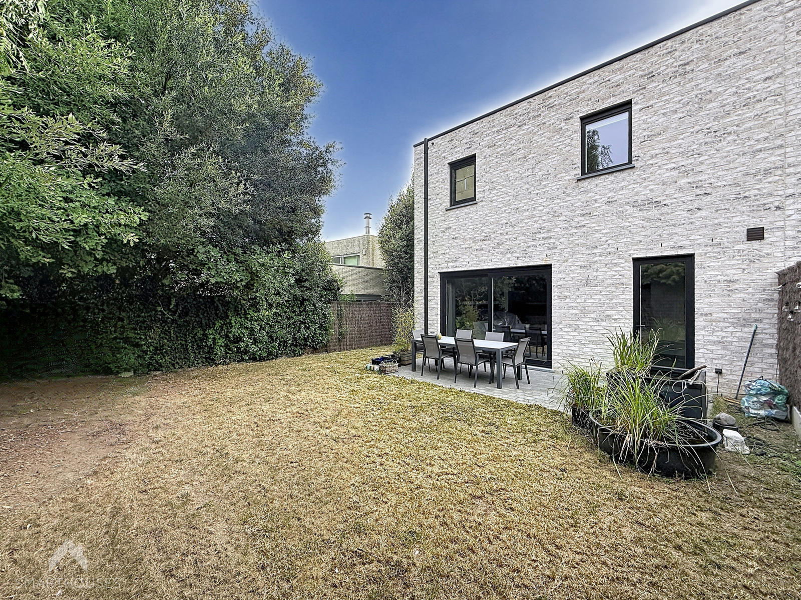 Halfopen BEN-woning met 4 slpkrs, garage, oprit en tuin - foto 5