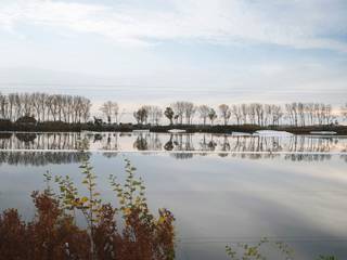 Dit uitzonderlijk ruime en lichtrijke hoekappartement van 215 m2, met 50 m2 zuid- en west georiënteerde terrassen is gelegen aan de oevers van...