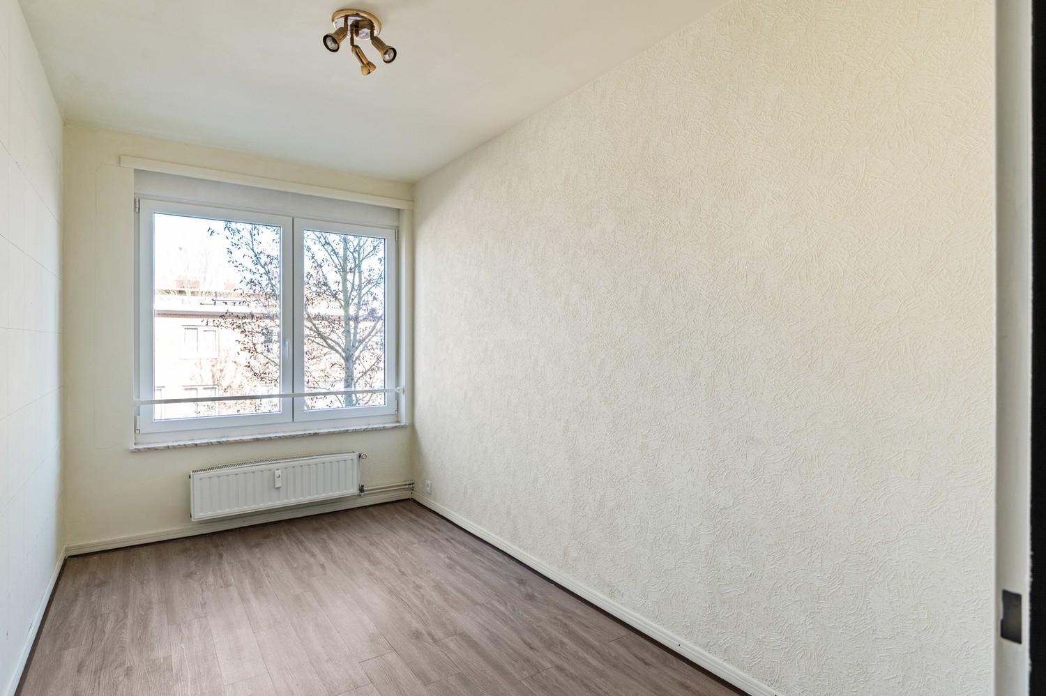 Lichtrijk appartement met 2 slaapkamers en ondergrondse parkeerplaats - foto 4