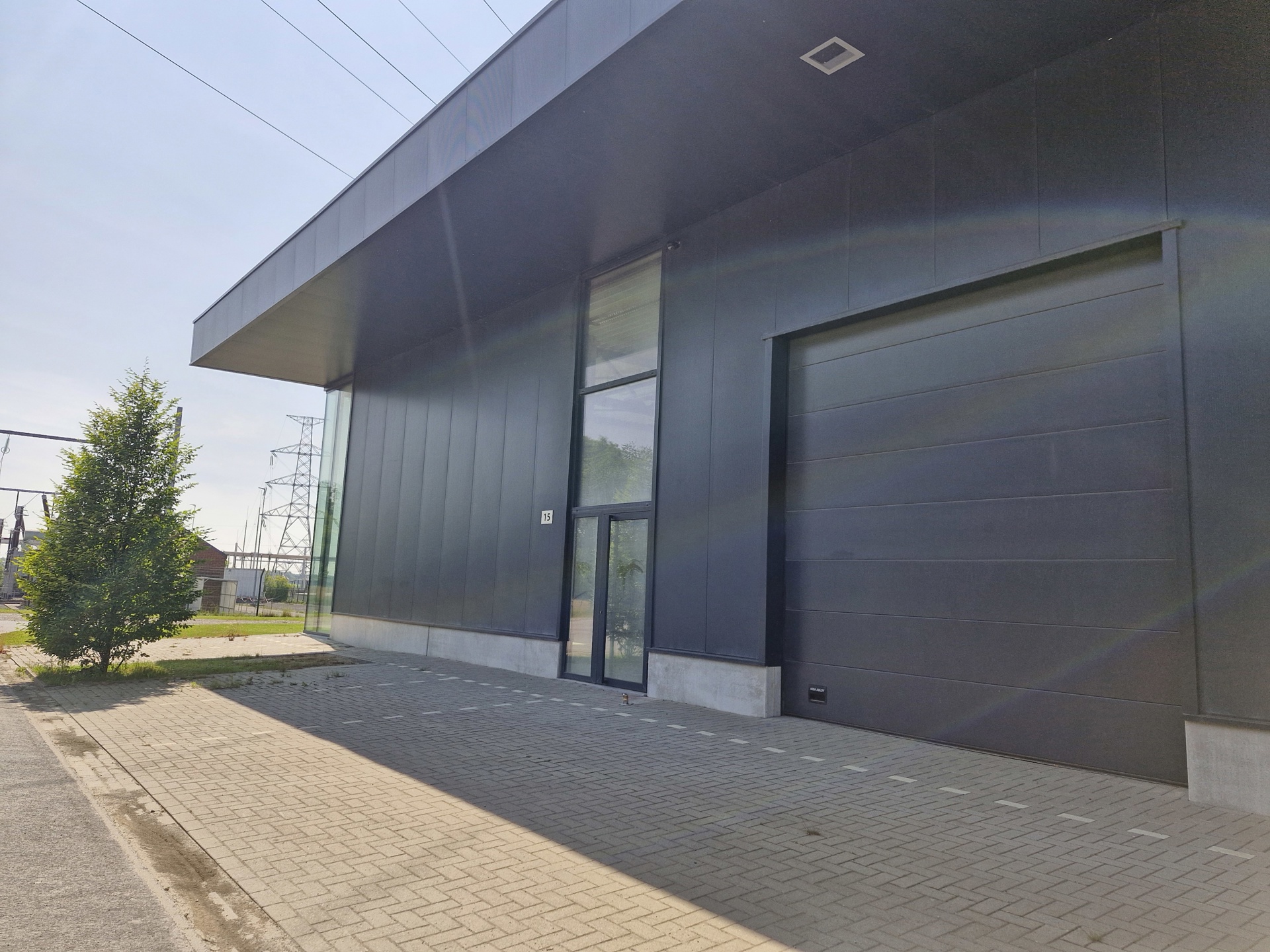 Nieuw magazijn +/- 580 m² te huur op Achêne. - foto 3