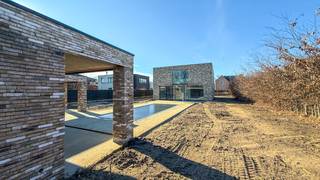 In een rustige doodlopende straat in het gegeerde Bolderberg te Heusden-Zolder, bevindt zich deze uitzonderlijke nieuwbouwvilla met een...