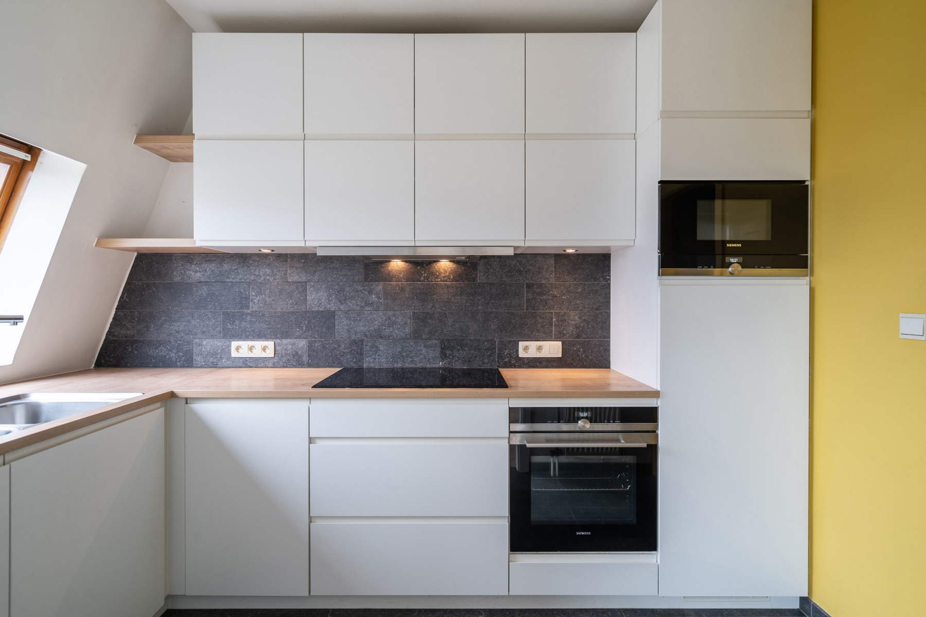 Ruim duplexappartement met 3 slaapkamers en inpandige garage - foto 4