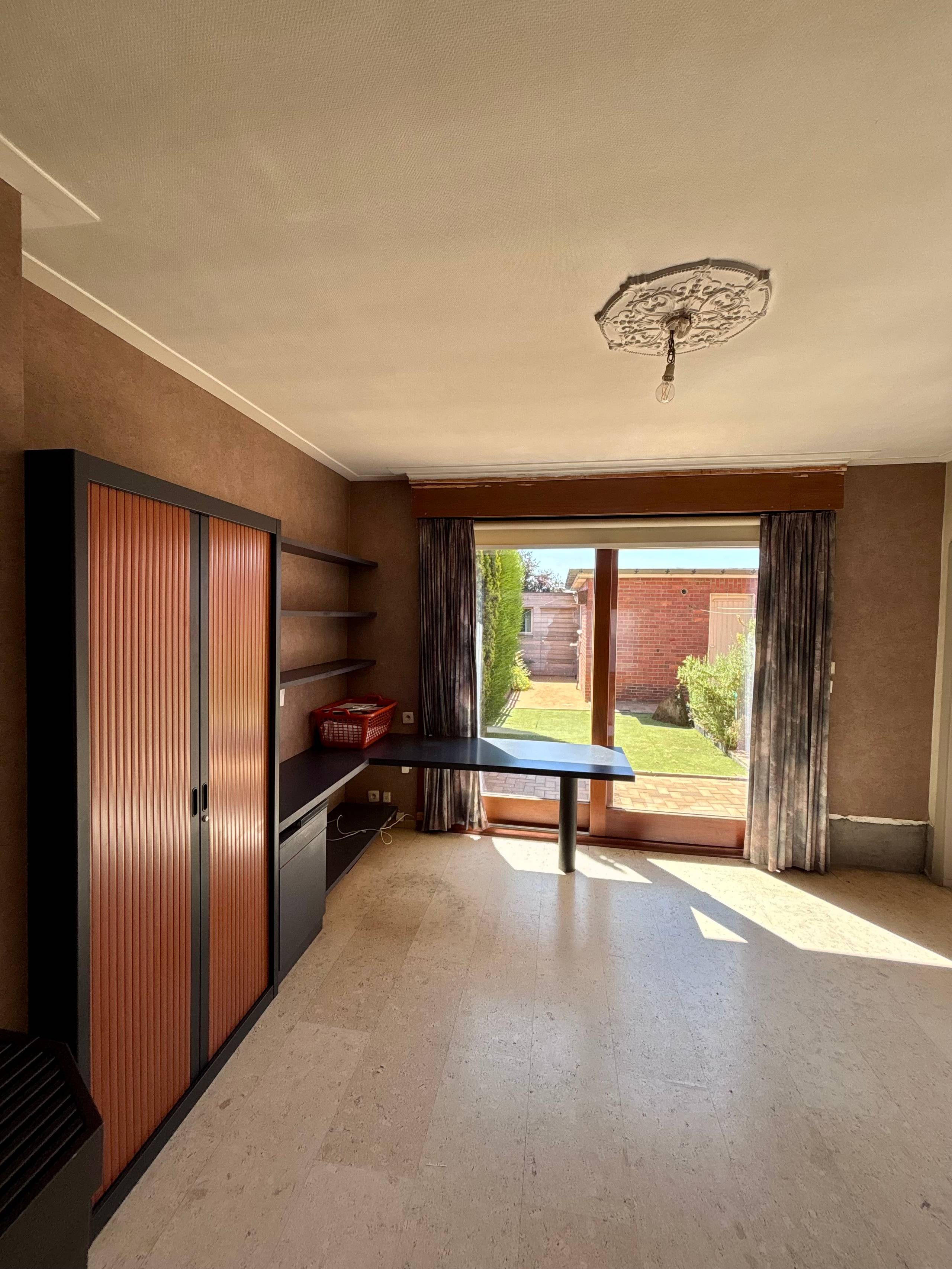 Woning met 3 slaapkamers, garage en uitweg - foto 4