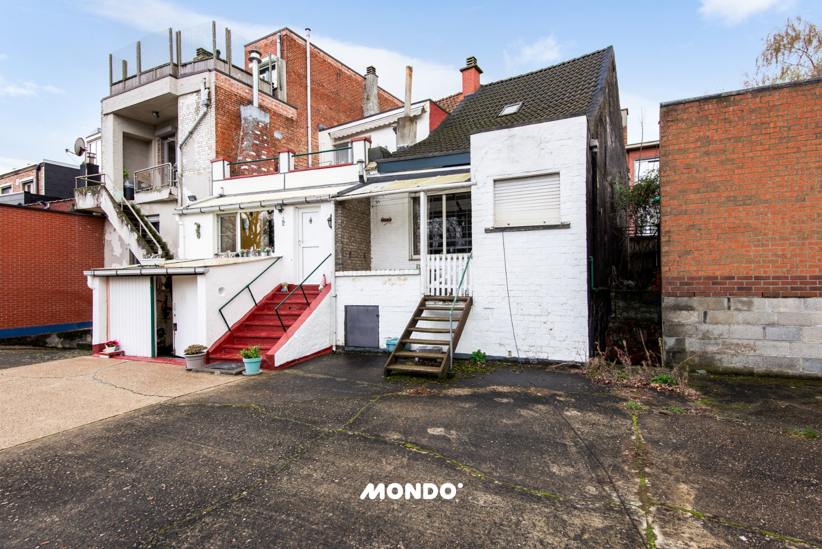 Te renoveren woning met tuin en garage op rustige ligging in Boom - foto 2