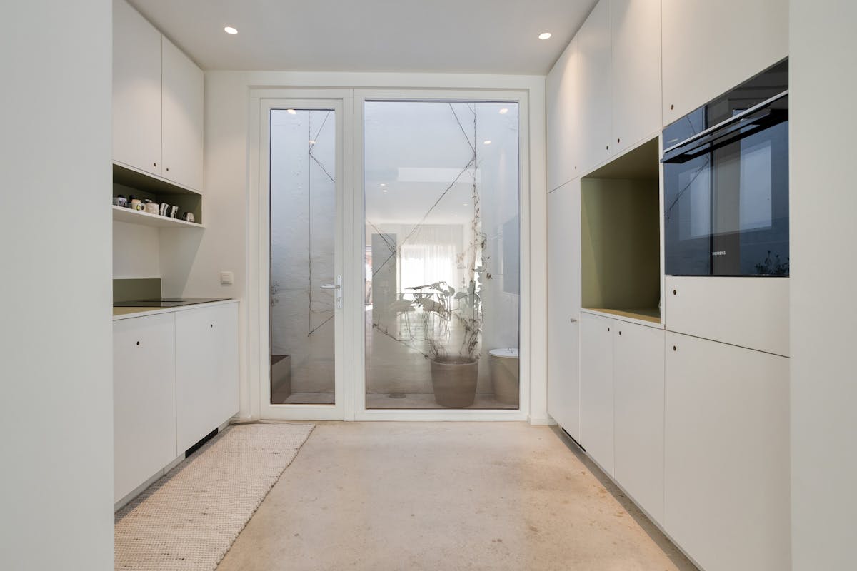 Architecturale stadswoning met minimalistische flair - foto 4