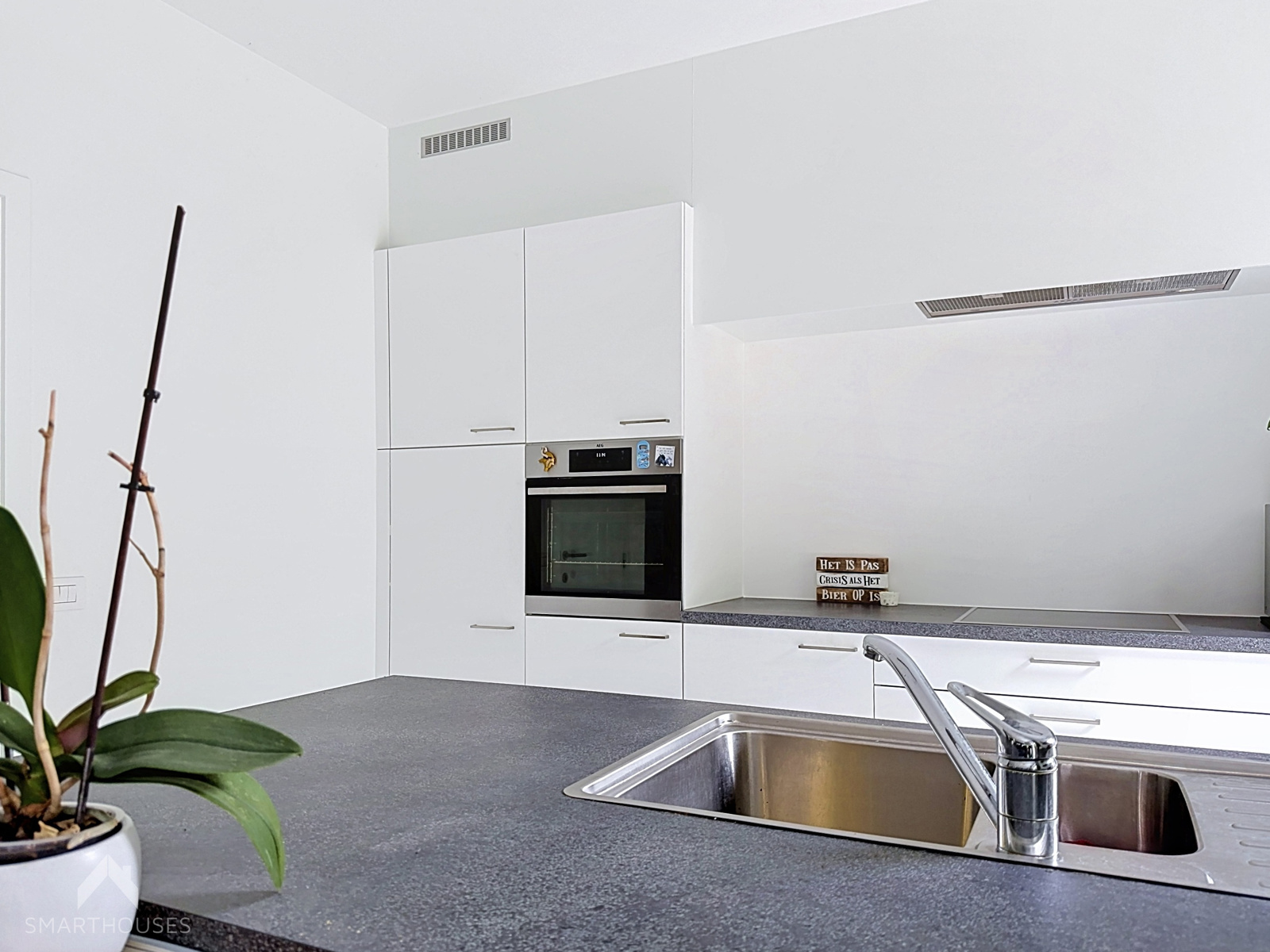 Halfopen BEN-woning met 4 slpkrs, garage, oprit en tuin - foto 5