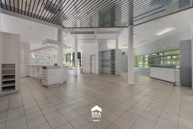 Ruim handelspand (+-405m2) met woonst in Peer centrum - foto 4