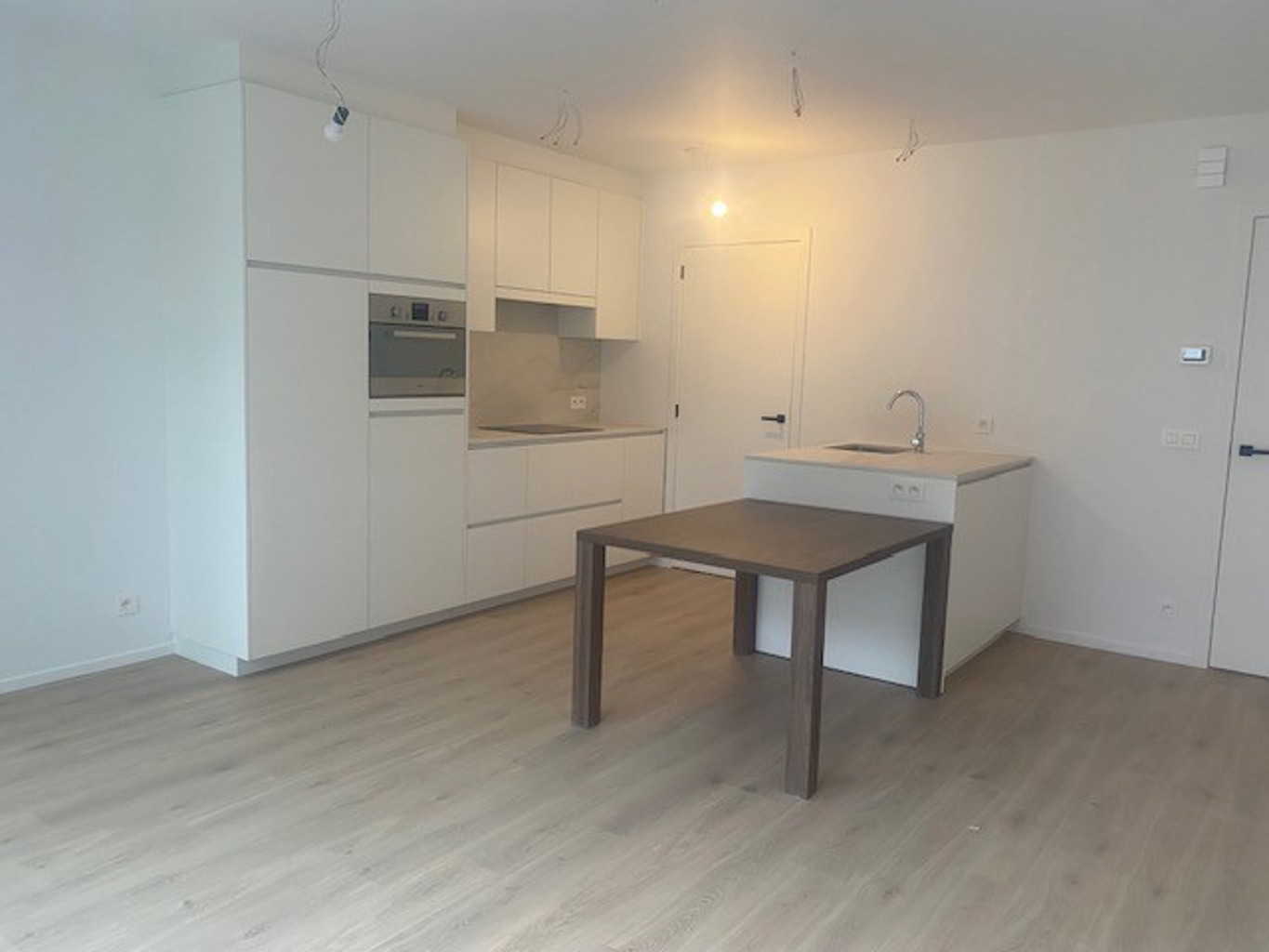 Gelijkvloers nieuwbouw appartement met terras en tuin - foto 3