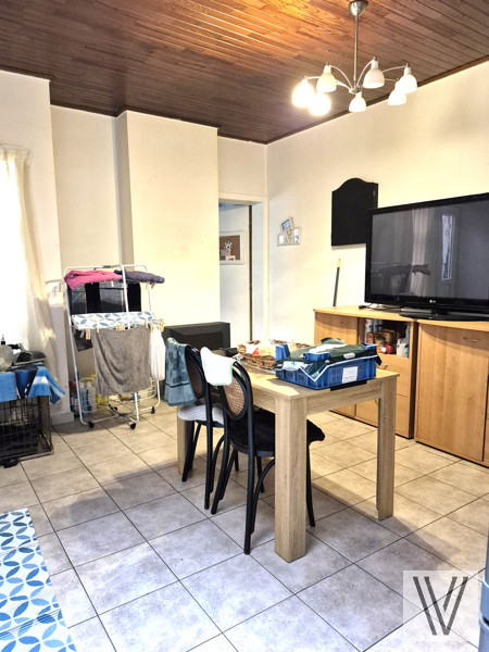 Op te frissen centraal gelegen woning met tuin - foto 4