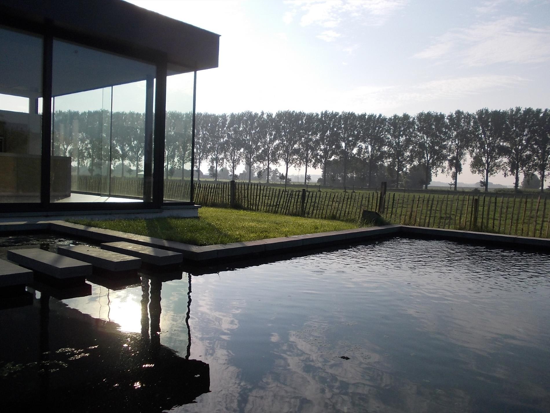 Karaktervolle fermette in Zomergem met zwemvijver en weids uitzicht - foto 4