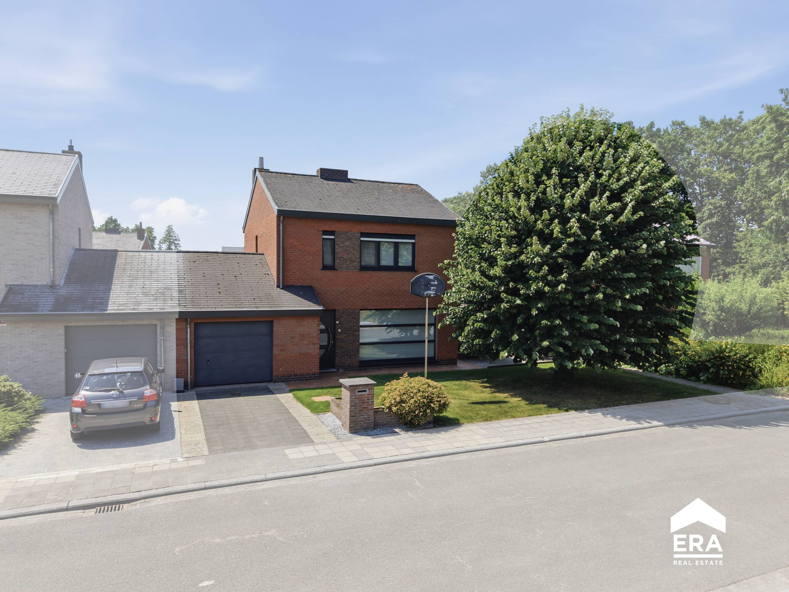 Halfopen bebouwing met 3slpk, garage en tuin - foto 1