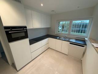 Gerenoveerde duplex in een kleine residentie in Grimbergen, omvattende: inkomhal met aparte wc, living (32m²) met toegang tot het groot terras...