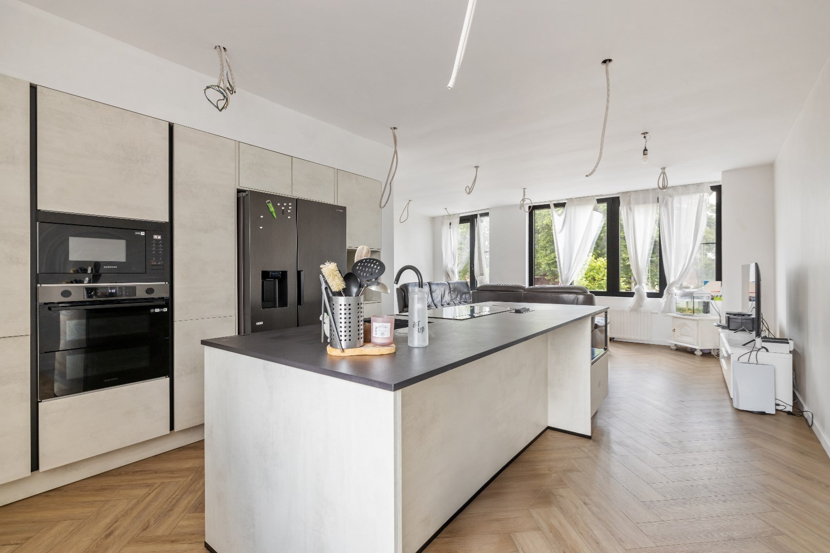 INSTAPKLARE BEL-ETAGE MET 4 SLPKS, TUIN EN GARAGE OP EEN TOPLIGGING IN HAMME - foto 5