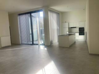 Gelegen op de gelijkvloerse verdieping van een nieuwbouwcomplex in het centrum van Kapellen bieden wij dit 2 slaapkamer appartement aan.De leefruimte...
