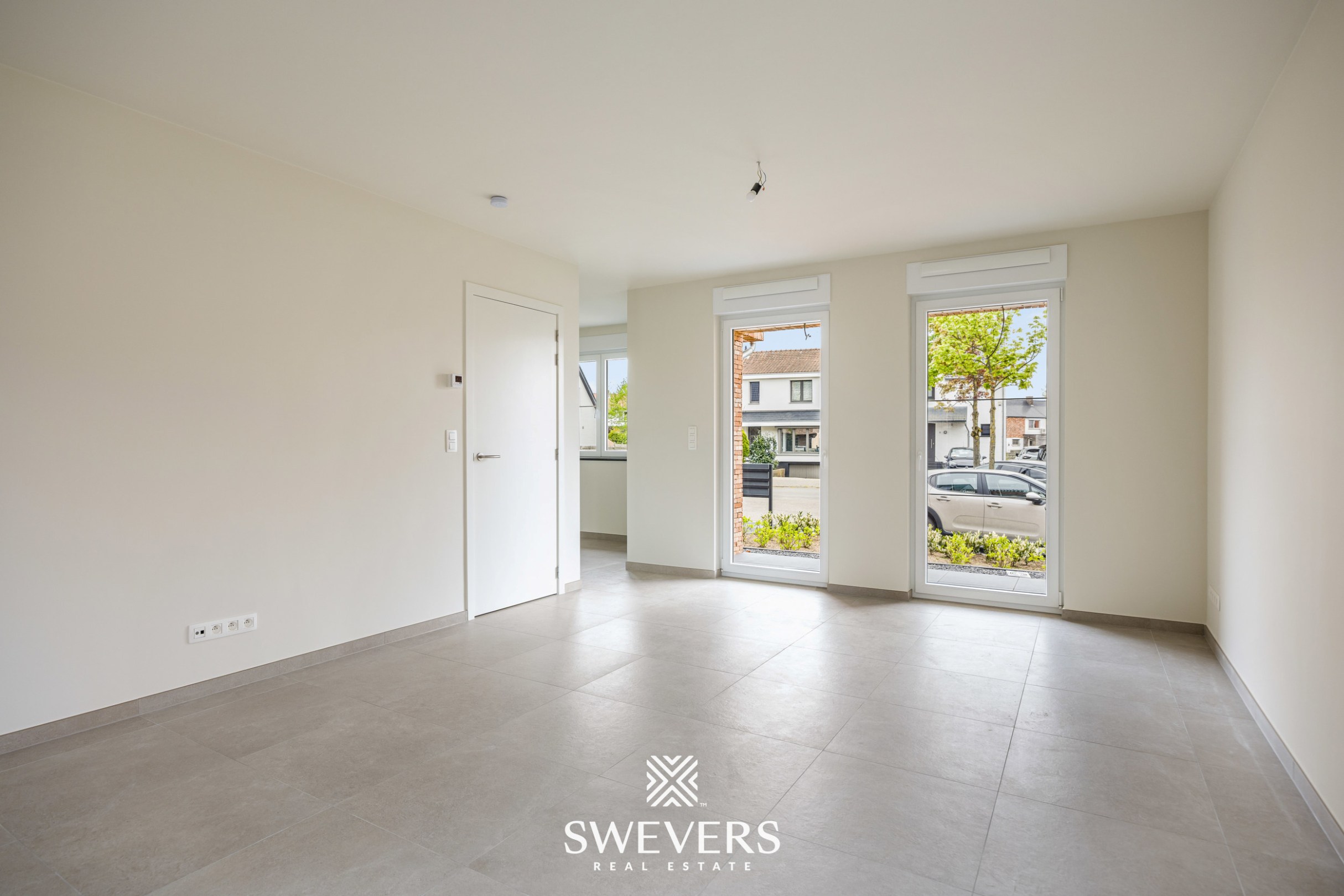 Modern gelijkvloers appartement met privétuin en dubbele parking - foto 2