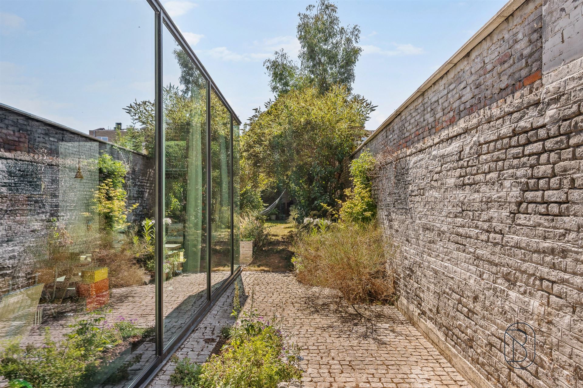 Prachtig gerenoveerde herenwoning met tuin &amp; atelier/duplex - foto 4