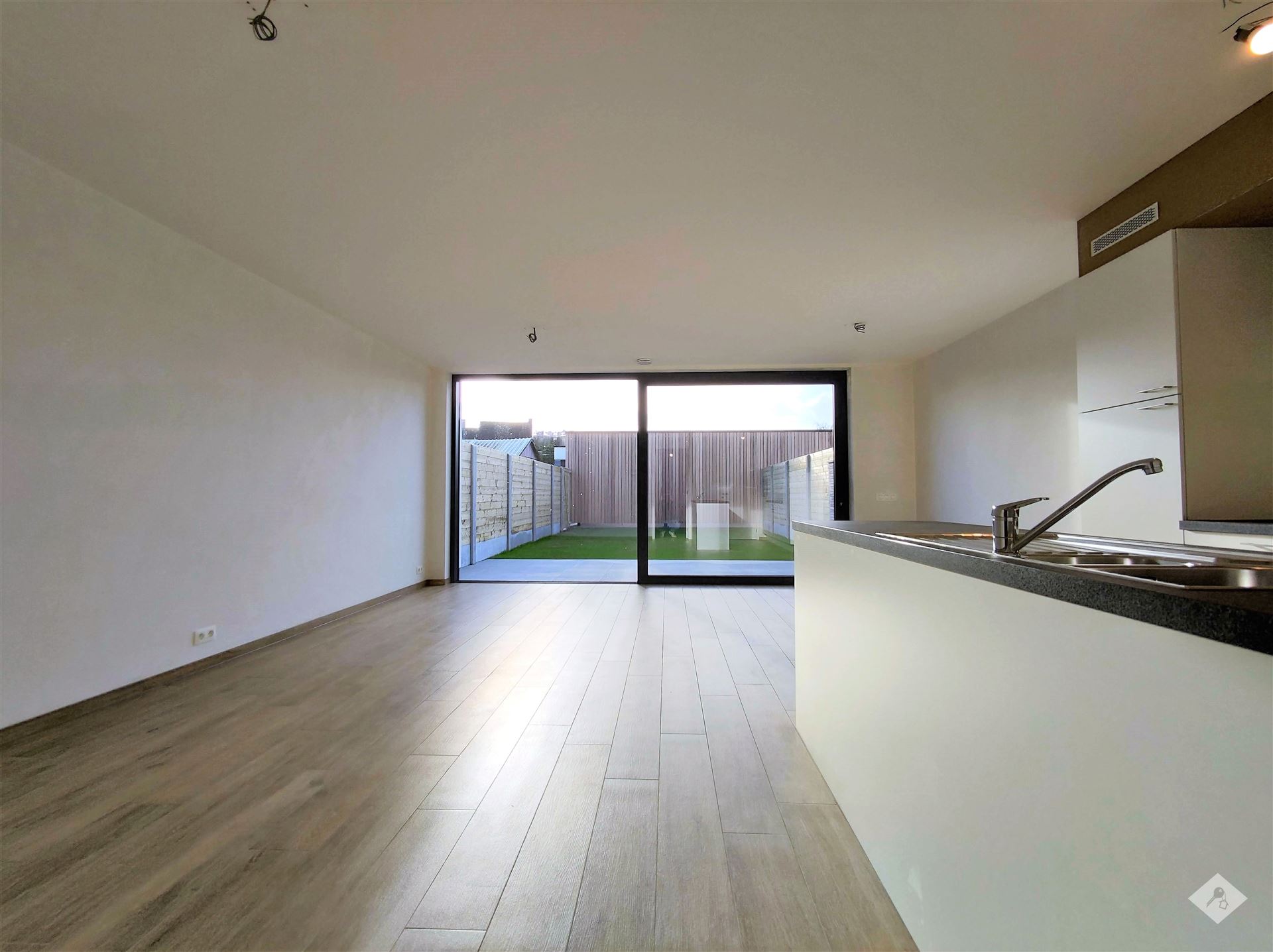 Prachtig gelijkvloers appartement met tuin in hartje Buggenhout - foto 2