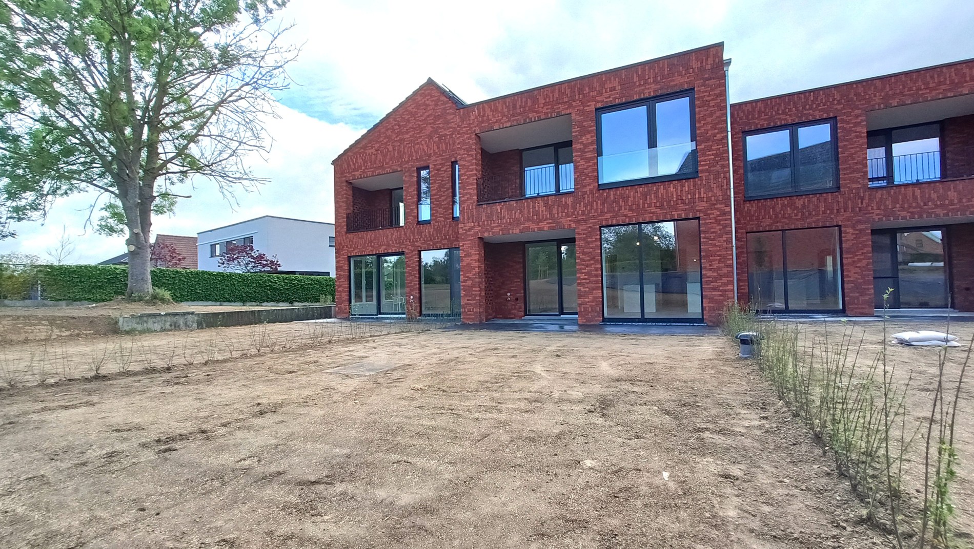 Nieuwbouwappartement met tuin en terras - foto 2