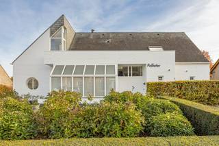 Palton troeven:- Residentiële locatie, grenzend aan natuurgebied- Schitterende achtertuin- Volop privacy- Tijdloze villa- Nabij Nederlandse...