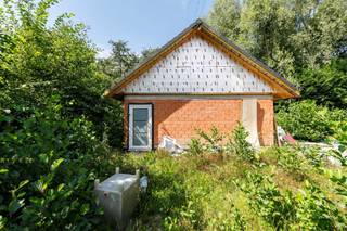 Af te werken vakantiewoning op prachtig perceel aan vaartPerceel van 1197.26 m2 te koop met mogelijkheid tot afwerken van een prachtige...