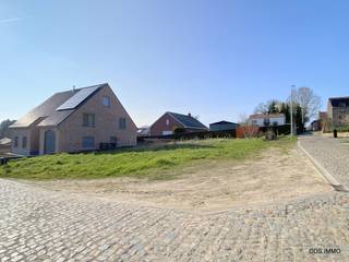 In het landelijke Kerkom, deelgemeente van Boutersem, bieden wij u deze BOUWGROND aan voor open bebouwing, met een oppervlakte van 5a 69ca...