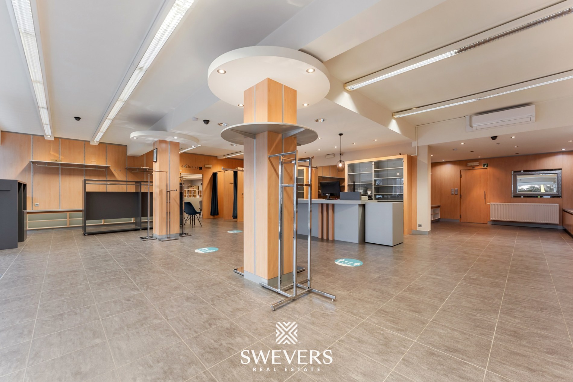 Opbrengsteigendom met handelspand, ruim appartement en uitbreidingspotentieel in hartje Heusden-Zolder - foto 3