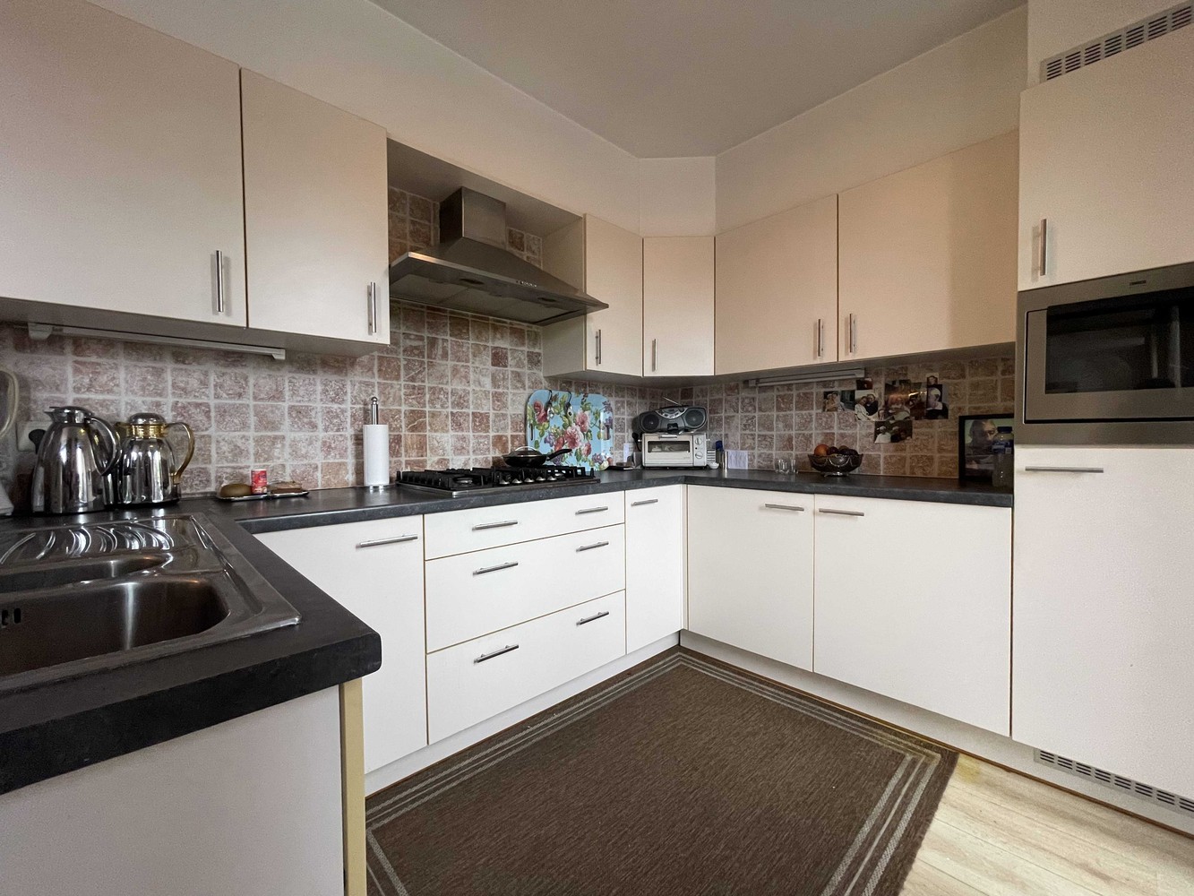 Investeringspand op vierde verdieping van exclusief gebouw in het hart van Genk. - foto 4