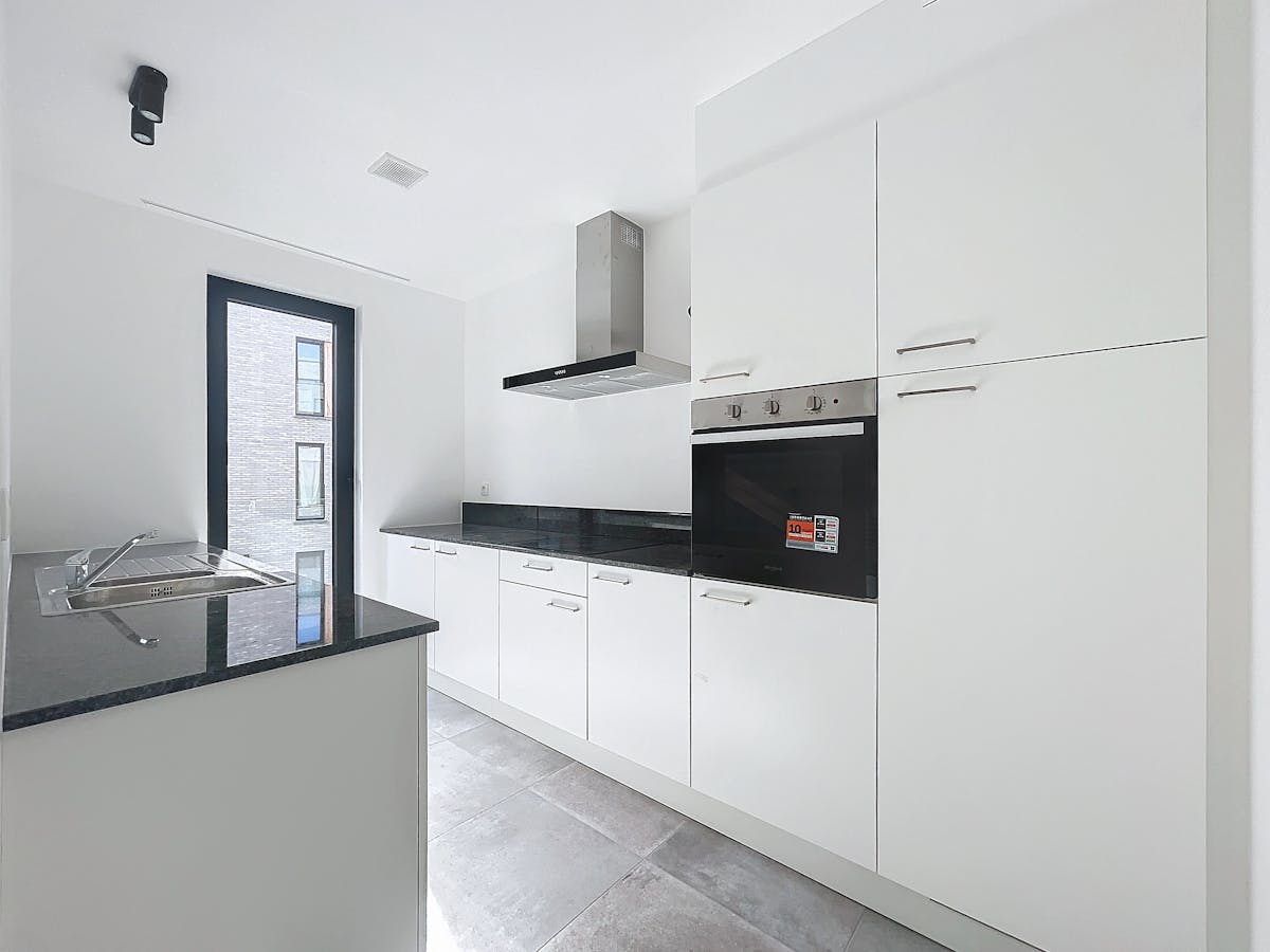 Nieuwbouwappartement met parking te huur in Harelbeke - foto 5