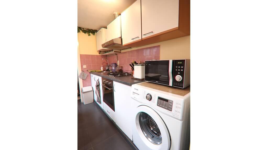 Comfortabele 2-slaapkamerwoning met Garage en Tuintje te koop in Brugge - photo 5