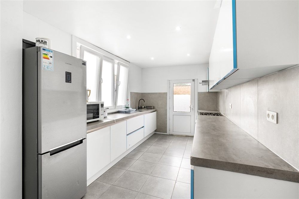 Volledig instapklare woning met 4 slaapkamers, 2 badkamers en grote buitenruimte op centrale locatie te Oostende - foto 4