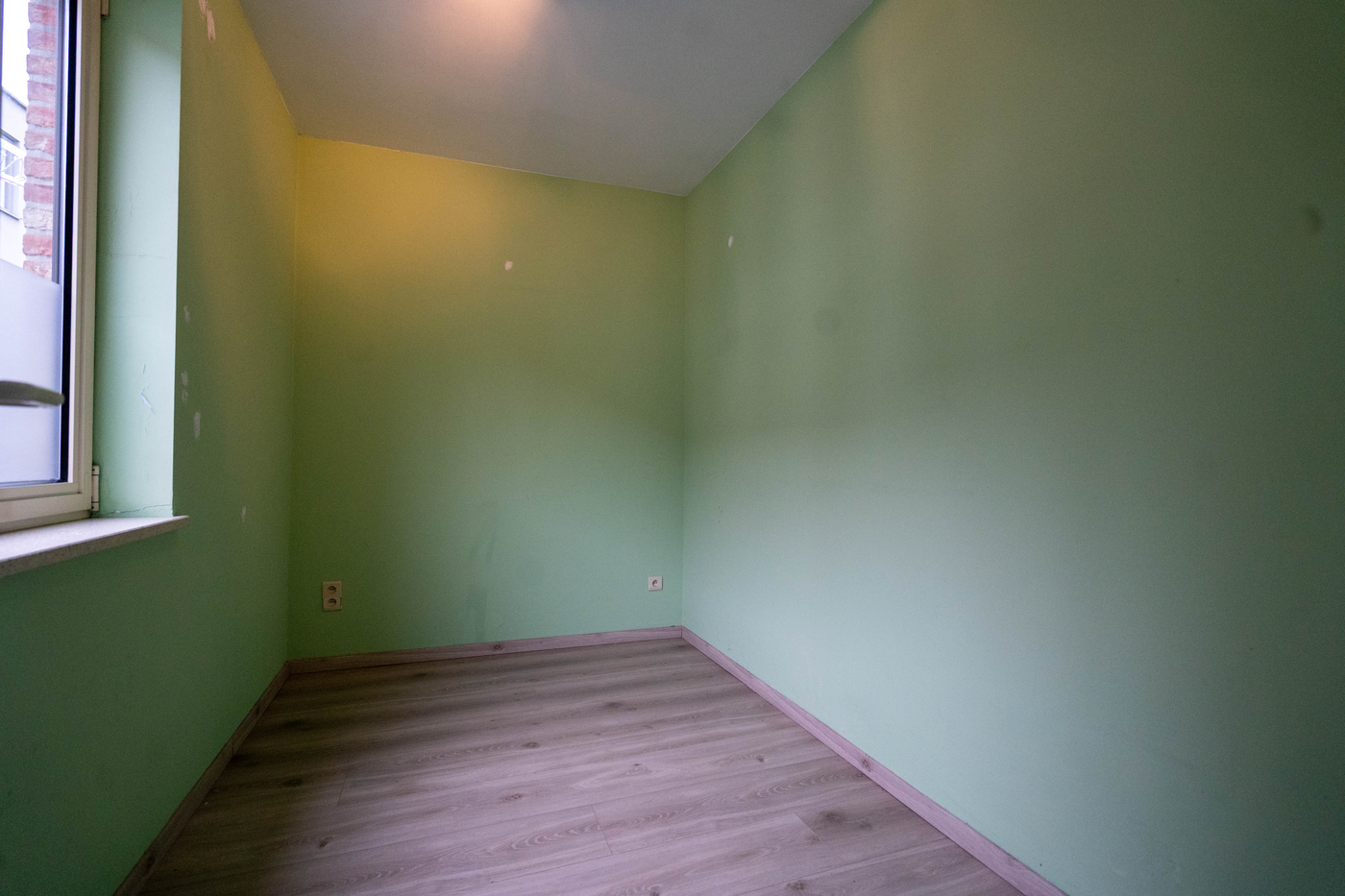 Centraal gelegen appartement met parkeerplaats - photo 5