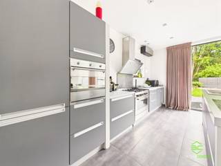 + If you click through to this property on our own website (www.empresaconsult.be), you will find a full 360° impression! +On the transit road between Hasselt and Bokrijk we find this recent family home on a south facing plot of 7a 68ca.Thanks to its central location, all amenities are easily accessible. In the immediate vicinity there is a kindergarten and elementary school, but also the colleges and universities in Diepenbeek are less than 4km away.The train station is less than 2km away and offers a smooth connection towards Leuven and Brussels. The city centers of Hasselt and Genk can be reached in less than 10 minutes by car.The house was built in 2010 which results in a nice EPC label B. With the addition of 14 solar panels the EPC score drops and an A label can be obtained.Recently air conditioners were installed in the living room and the night hall.The house has a partial cellar which provides additional storage space.On the ground floor, the house is entered through the entrance hall from where the guest toilet, the living room, the laundry room and the first bedroom/office are accessible. The beautiful glass door opens into the open living space where there is a cozy sitting area and a beautiful open kitchen. Thanks to the large windows there is a pleasant light and connection to the garden. The kitchen is hyper-equipped and features both a gas stove and an induction stove.The convenient adjacent laundry room offers additional storage and stairs to the basement. The laundry room is also accessible through an exterior door, extra convenient in conjunction with the shower room.Upstairs, three spacious bedrooms and the bathroom can be found. This bathroom was equipped with a bathtub, a convenient walk-in shower, a toilet and a cabinet with double sink. The roof terrace can be reached through the door in the night hall.Outside we find an enclosed garden equipped with an electric gate, a pleasant terrace and a large garage. The southern orientation allows to enjoy the sun at all times of the day.Thanks to the shower room and the bedroom on the ground floor, the house is also very suitable as a multi-generational house.
