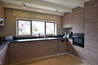 Op zoek naar een instapklare woning met ruimte, licht en omgeven door groen? Deze charmante eigendom, gelegen vlakbij het centrum van Gullegem, biedt een comfortabele woonervaring met alle voorzieningen op het gelijkvloers én uitbreidingsmogelijkheden op de zolderverdieping.<br /><br />Indeling als volgt:<br />Bij het binnenkomen word je verwelkomd in een statige inkomhal met een apart gastentoilet. De lichtrijke leefruimte van 40 m² creëert een aangename sfeer en grenst aan de volledig geïnstalleerde keuken met ontbijthoek. Praktisch gemak vind je in de dubbele garage en een extra berging.<br /><br />De nachthal leidt naar de badkamer, uitgerust met een inloopdouche, een tweede toilet en een dubbel lavabomeubel. Verder zijn er 3 ruime slaapkamers op de gelijkvloerse verdieping.<br /><br />De vaste trap brengt je naar de zolder van maar liefst 100 m², perfect voor extra slaapkamers, een hobbyruimte of opbergruimte.<br /><br />Buiten wacht een ware groene oase!<br />De prachtig aangelegde, Zuidgerichte tuin biedt een idyllische plek om tot rust te komen, met diverse sfeervolle zithoekjes om volop van het buitenleven te genieten.<br />De 2 polyvalente ruimtes zorgen voor extra opbergmogelijkheden of kunnen naar wens worden ingevuld (denk maar aan poolhouse, bureauruimte, ...).<br /><br />Daarnaast biedt het perceel ruimte aan meerdere private parkeerplaatsen, zowel vooraan het perceel maar ook aan de achterzijde van de woning.<br /><br />Klinkt dit als muziek in de oren? Dit is jouw kans! Contacteer ons voor een bezoek.<br /><br />LEUKE EXTRA'S: CV op aardgas, 2 regenputten, zonnepanelen, ...<br /><br />Onze ref. DEV4785